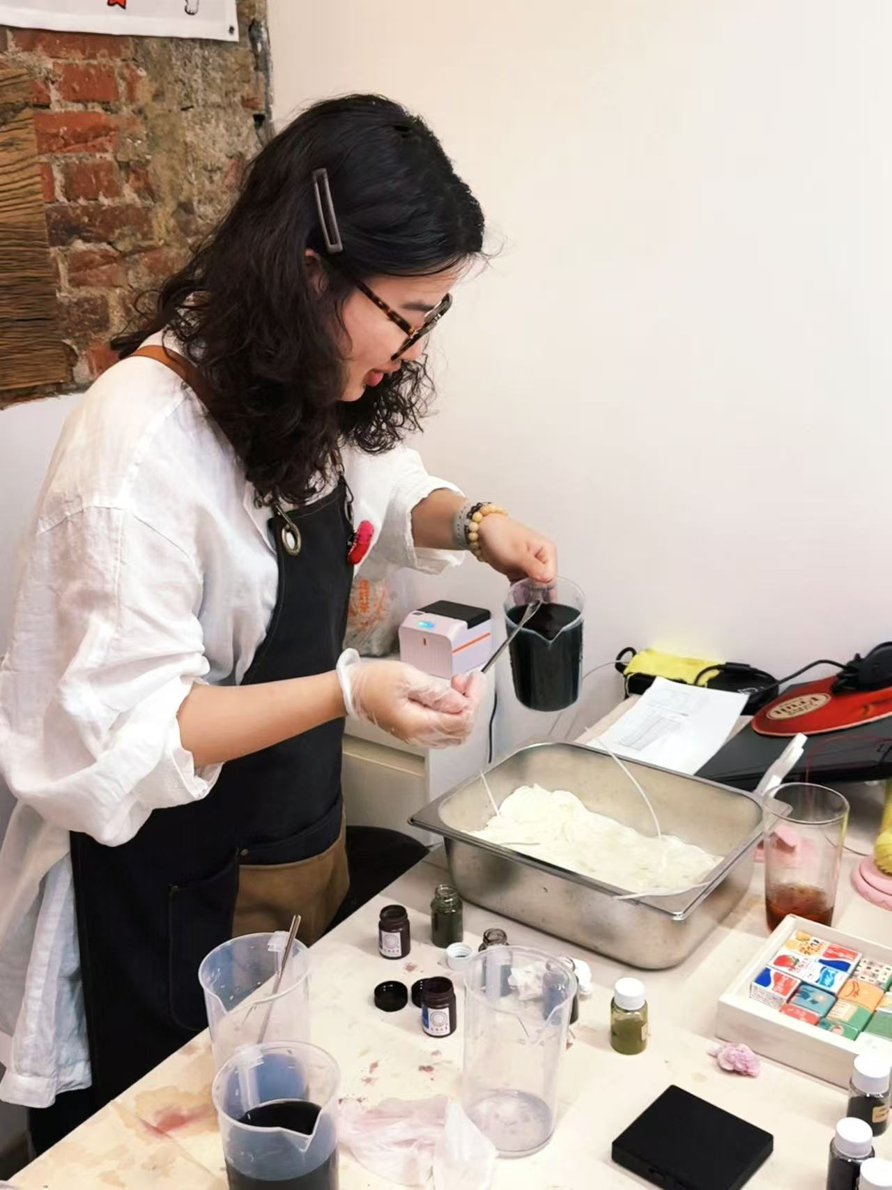 The CheckMend co-founder testing herbal dyes on yarn