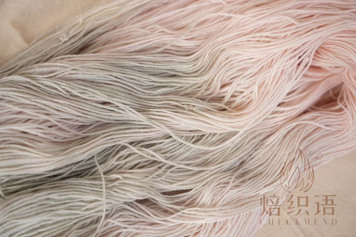 Close view of the subtle tonal variation in the dyed yarn
